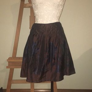 MSSP maroon skirt with dark blue roses.